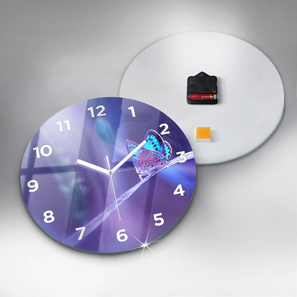 Round glass clock Butterfly on the grass
