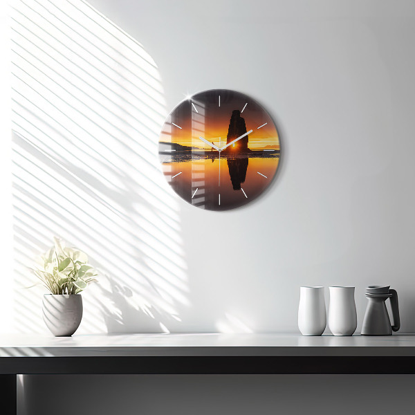 Round glass clock Runner and sunset