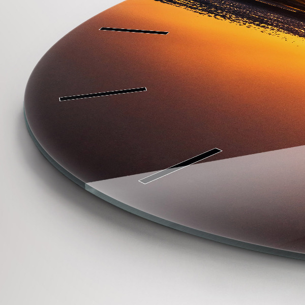 Round glass clock Runner and sunset