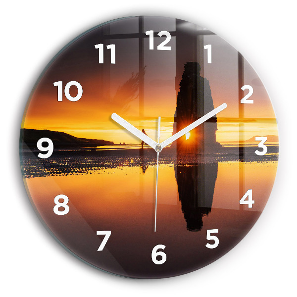 Round glass clock Runner and sunset