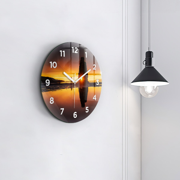 Round glass clock Runner and sunset