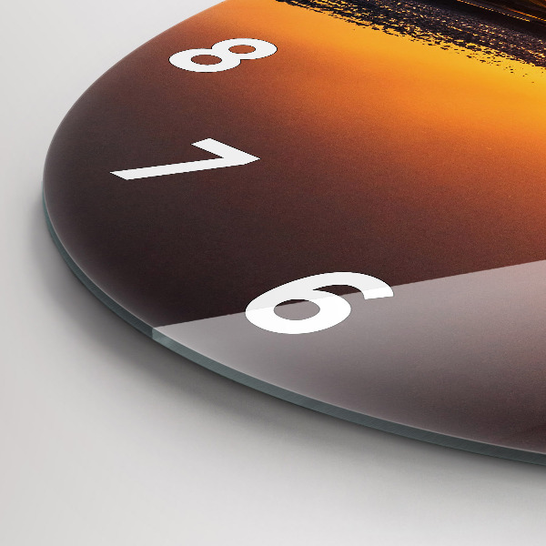 Round glass clock Runner and sunset