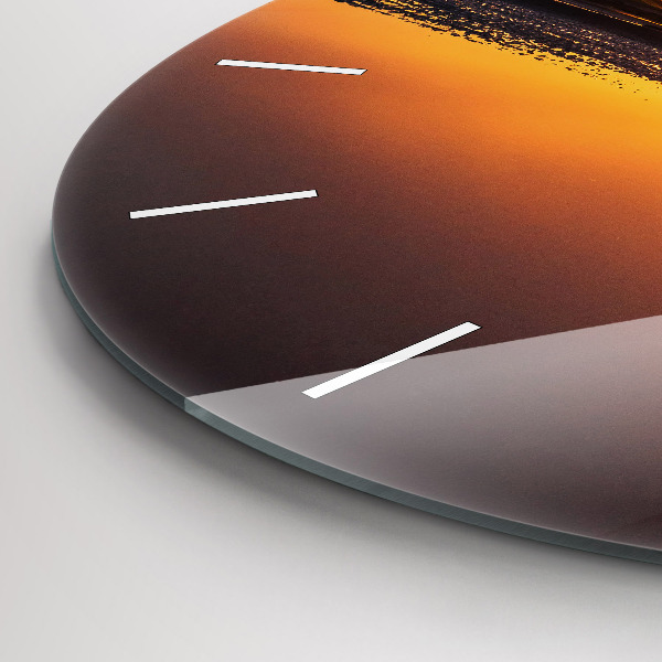 Round glass clock Runner and sunset