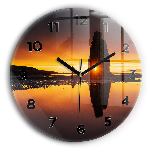 Round glass clock Runner and sunset
