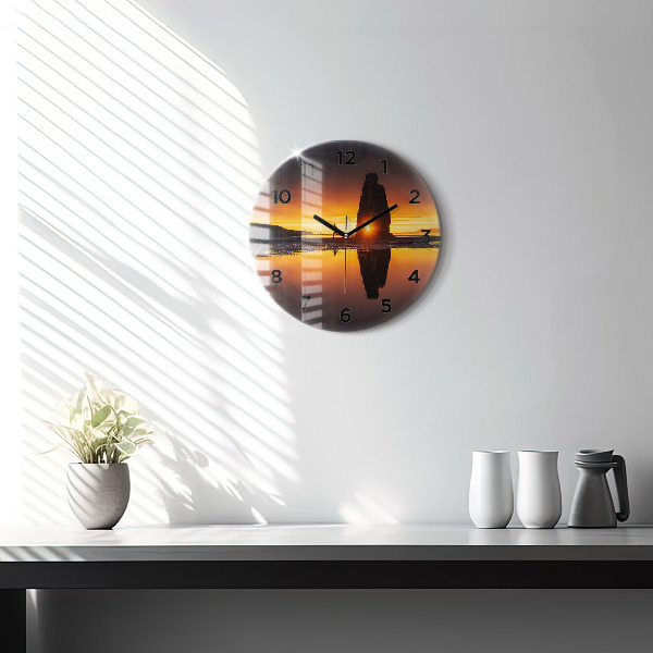 Round glass clock Runner and sunset