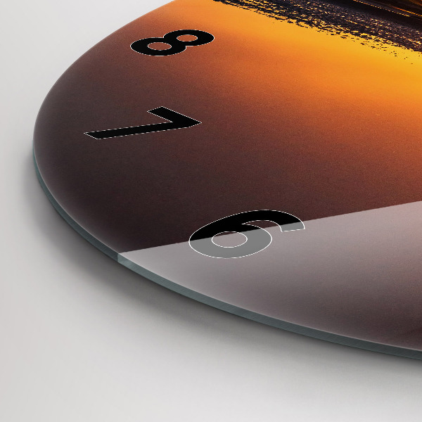 Round glass clock Runner and sunset
