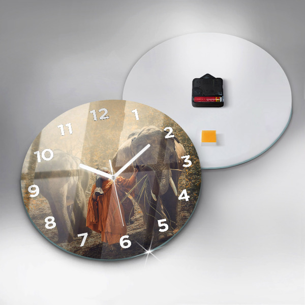 Round glass clock Monk leading elephants