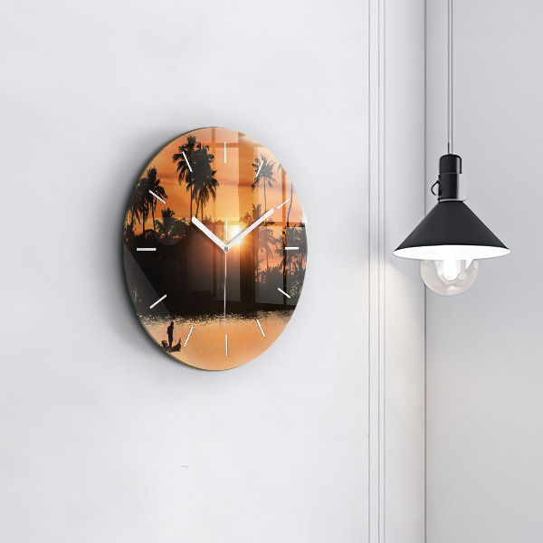 Round glass clock Sunset and palm trees
