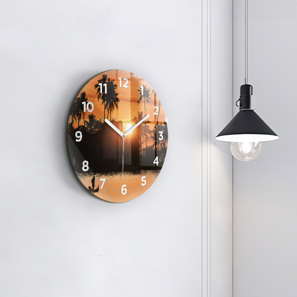 Round glass clock Sunset and palm trees