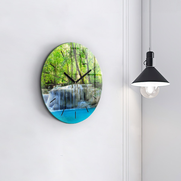 Round glass clock Waterfall in the forest