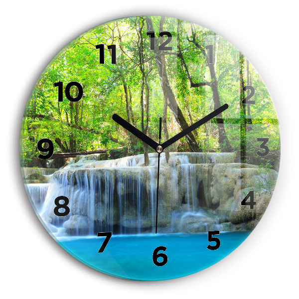 Round glass clock Waterfall in the forest