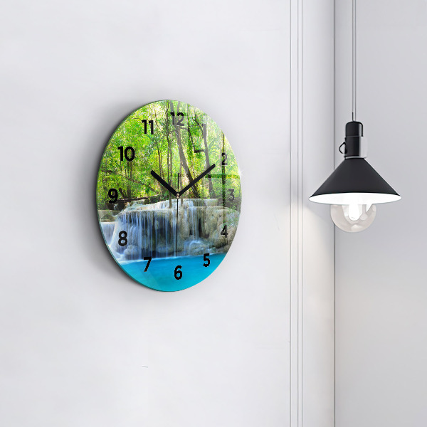 Round glass clock Waterfall in the forest