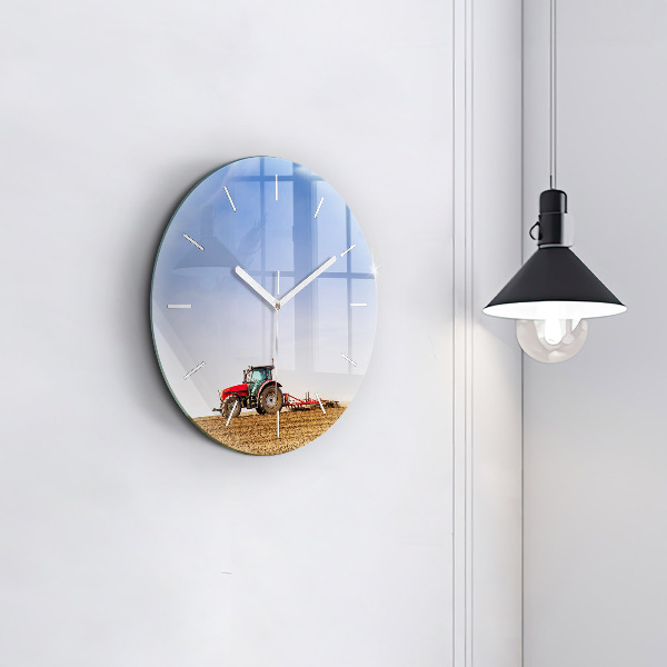 Round glass clock Farmer on a tractor