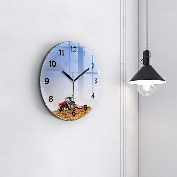 Round glass clock Farmer on a tractor