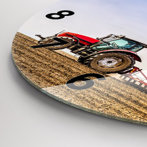 Round glass clock Farmer on a tractor