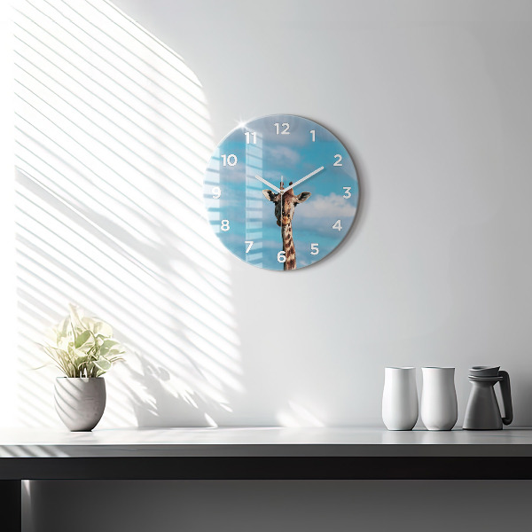 Round glass clock Giraffe head against the sky
