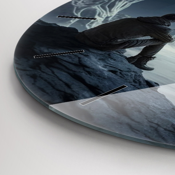 Round glass clock Man in front of the moon