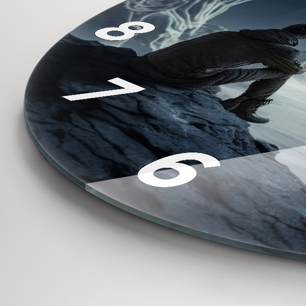 Round glass clock Man in front of the moon