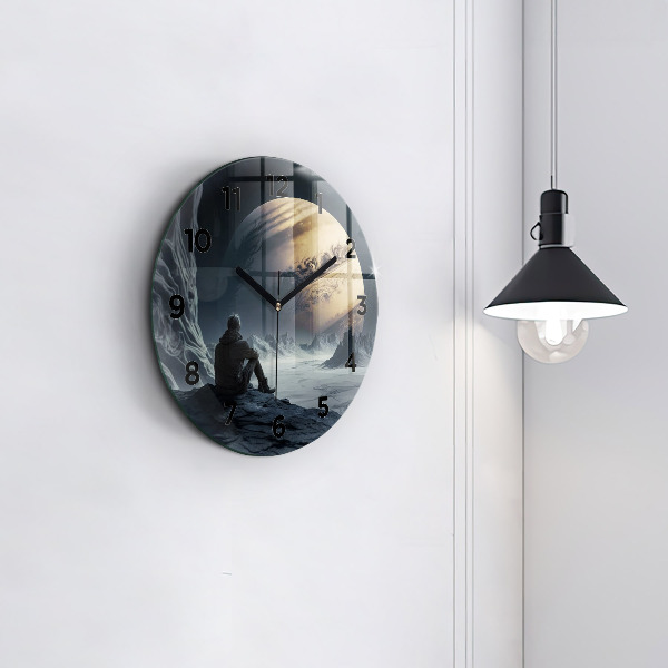 Round glass clock Man in front of the moon