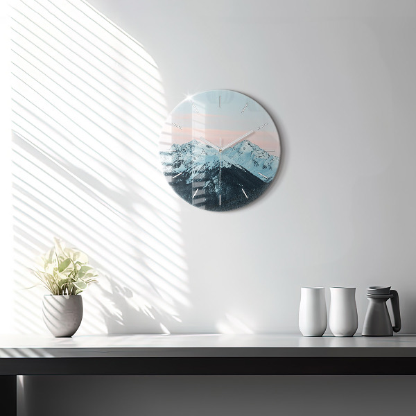 Round glass clock Mountain range in winter