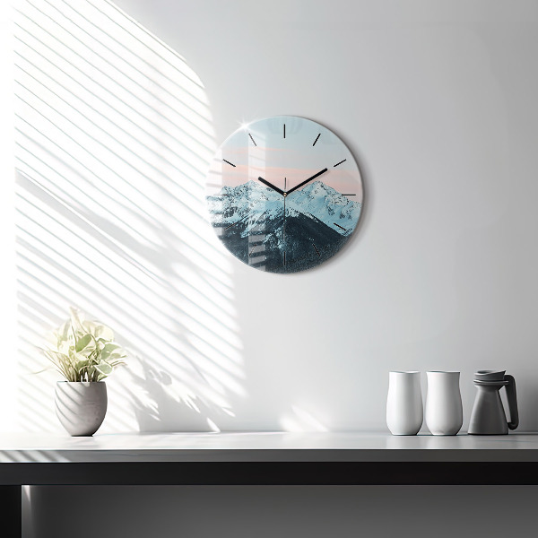 Round glass clock Mountain range in winter