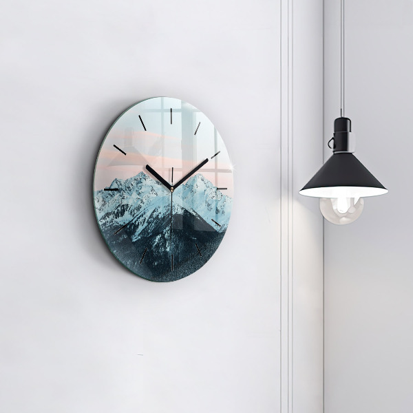 Round glass clock Mountain range in winter