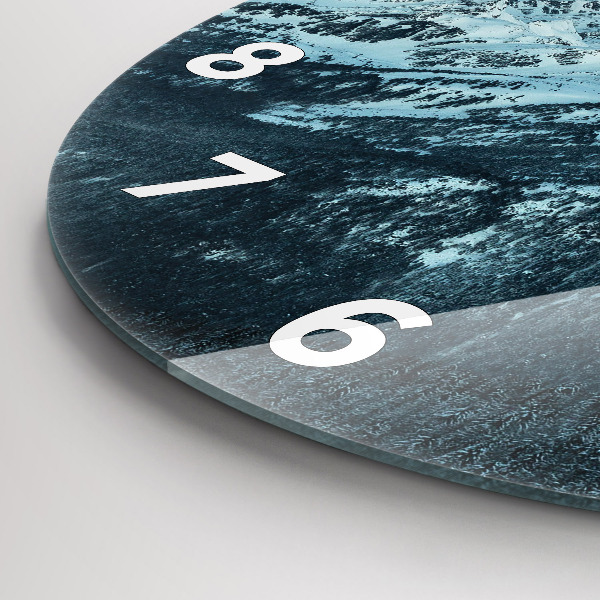 Round glass clock Mountain range in winter