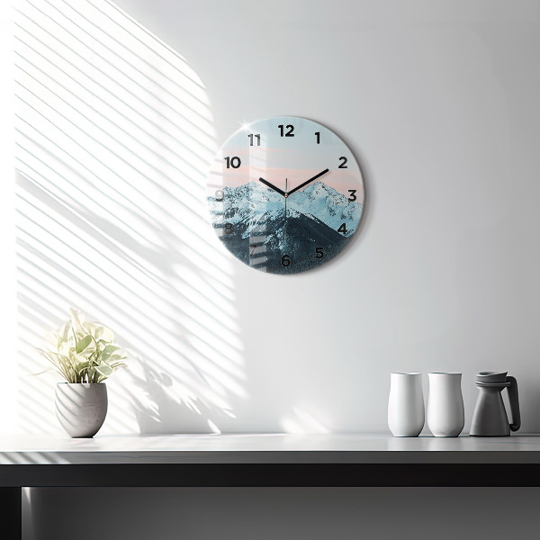 Round glass clock Mountain range in winter