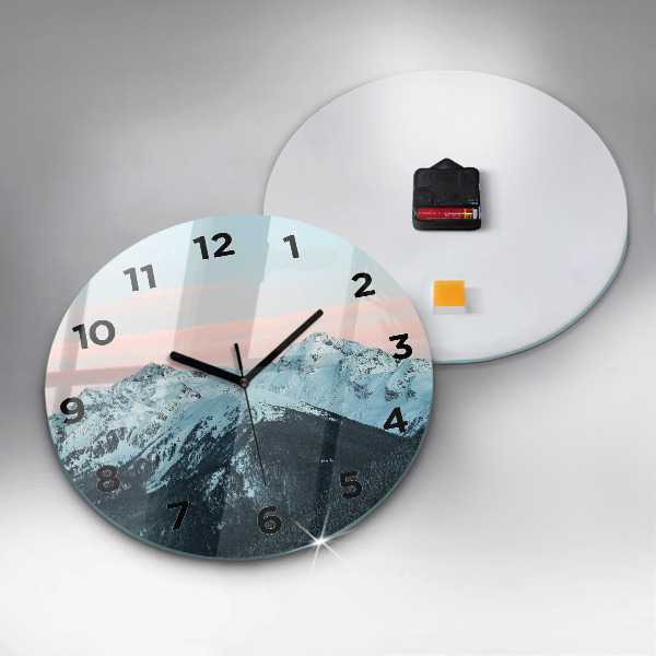 Round glass clock Mountain range in winter
