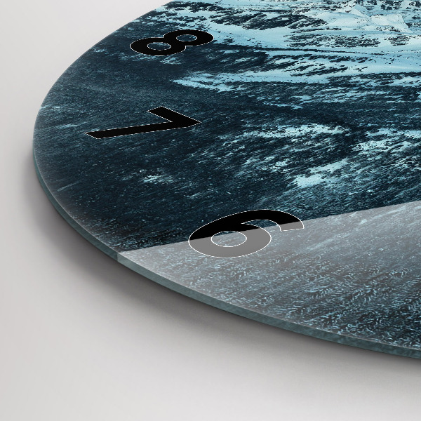 Round glass clock Mountain range in winter