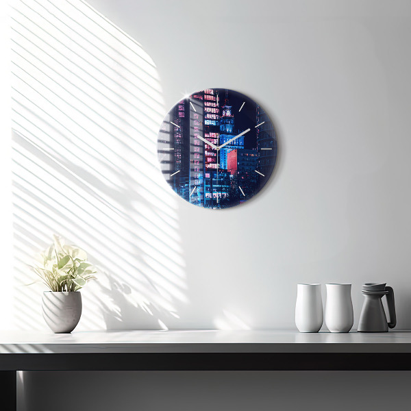 Round glass clock Warsaw at night