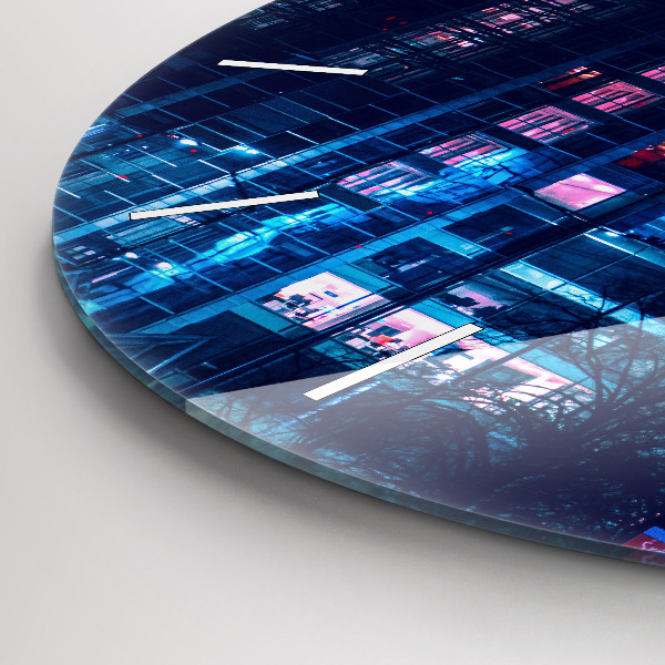 Round glass clock Warsaw at night