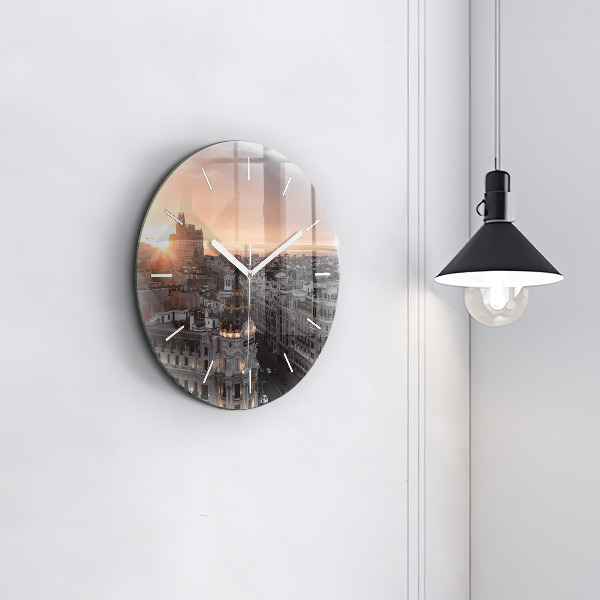 Round glass clock Cities at sunset