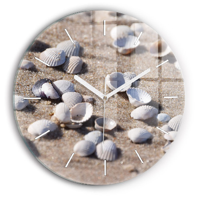 Round glass clock Seashells on the beach
