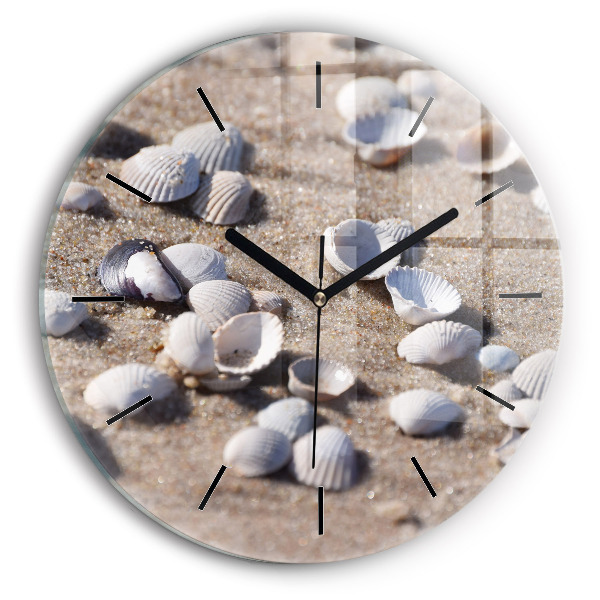 Round glass clock Seashells on the beach