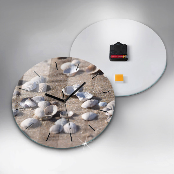 Round glass clock Seashells on the beach
