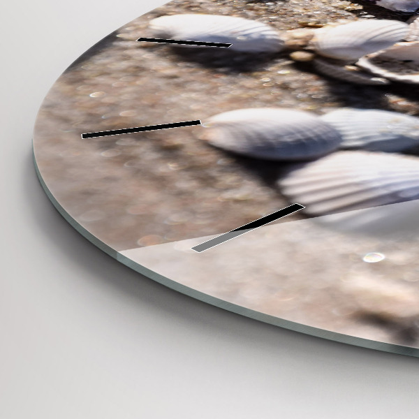 Round glass clock Seashells on the beach