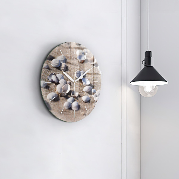Round glass clock Seashells on the beach