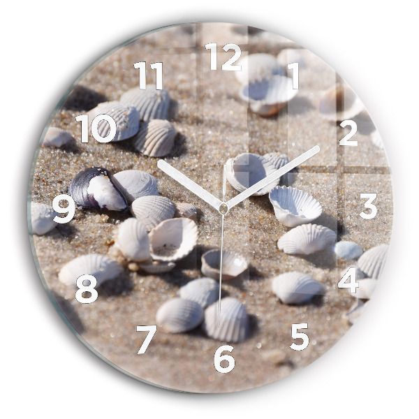 Round glass clock Seashells on the beach