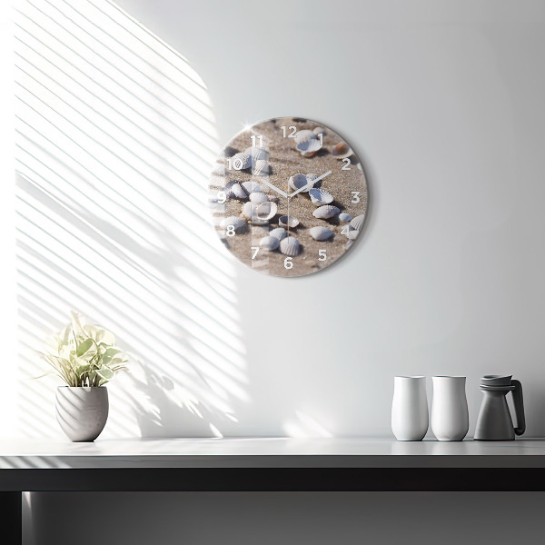 Round glass clock Seashells on the beach