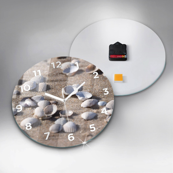 Round glass clock Seashells on the beach