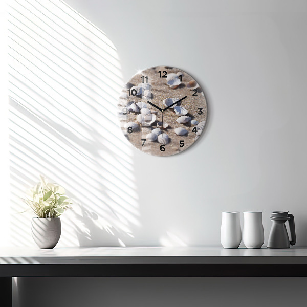 Round glass clock Seashells on the beach