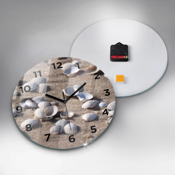 Round glass clock Seashells on the beach