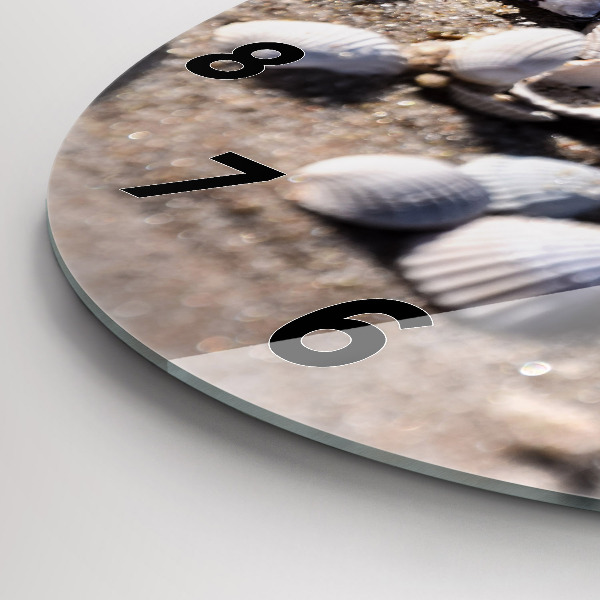 Round glass clock Seashells on the beach