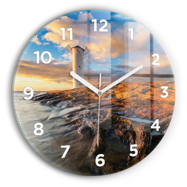 Round glass clock The Lighthouse and the Baltic Sea