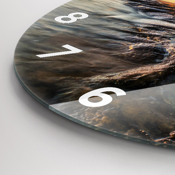 Round glass clock The Lighthouse and the Baltic Sea
