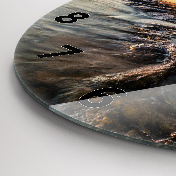 Round glass clock The Lighthouse and the Baltic Sea