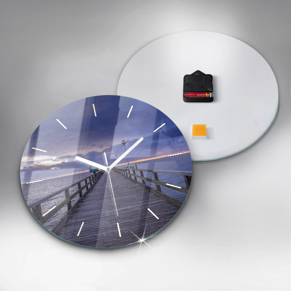 Round glass clock Pier on the Baltic Sea