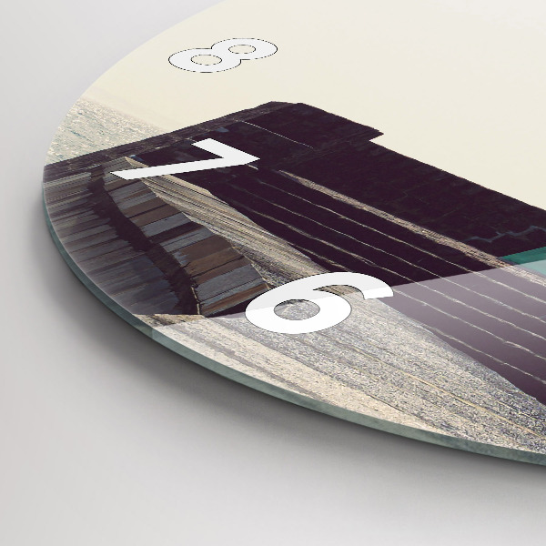 Round glass clock The lighthouse and the sea
