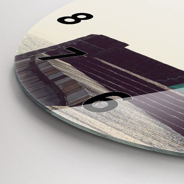 Round glass clock The lighthouse and the sea
